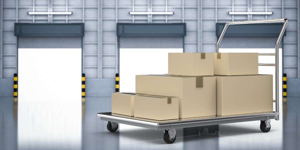 Warehouse picking solutions with boxes on a trolley near dispatch doors